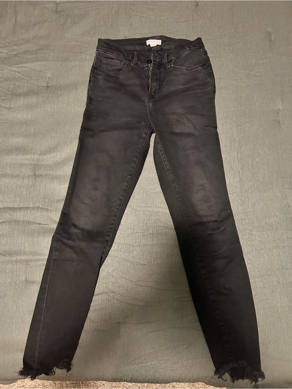 Good American Black Skinny Jeans with Frayed Hem